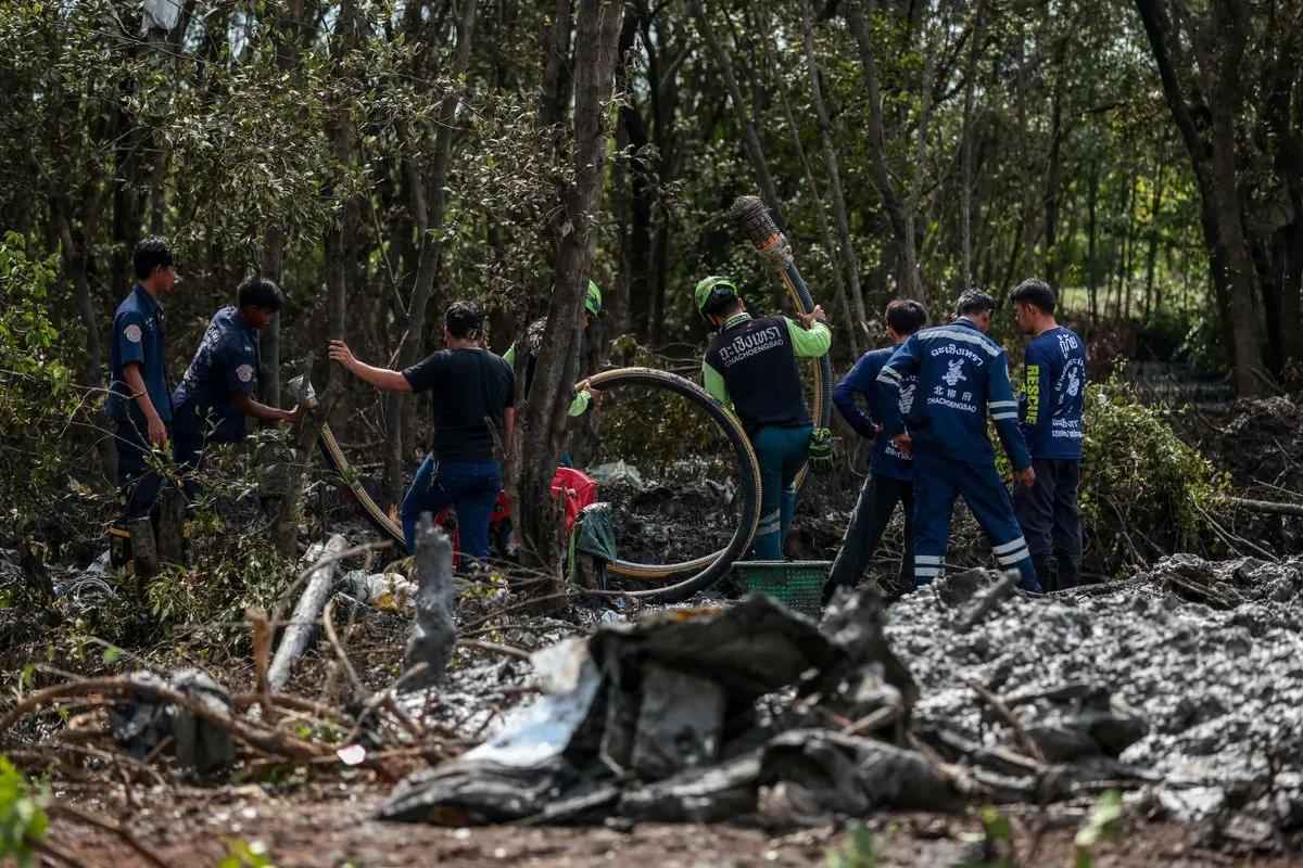 Thai Rescuers Search Muddy Terrain for Victims of Charter Plane Crash