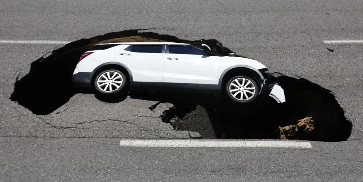 Elderly Couple Rescued After SUV Plunges into Seoul Sinkhole