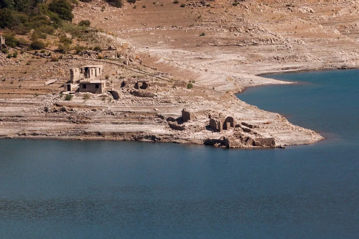 Greece's Lake Mornos Shrinks, Unveiling Submerged Village Amid Water Crisis