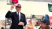 Biden's Brief Trump Cap Moment Sparks Social Media Misinterpretation