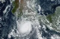 Hurricane John Intensifies, Threatens Mexico's Southwest Coast