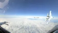 Russian Jet's Risky Maneuver Near U.S. F-16 Sparks Concern Over Arctic Security