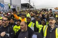 Biden's Pro-Union Stance Secures Temporary Port Deal, Raises Questions