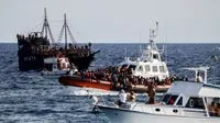 Italy's migrant plan hits snag as court orders return from Albania