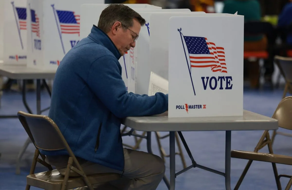 Former president makes surprise appearance at Delaware voting location