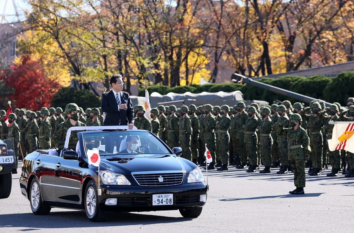 Japan's leader promises stronger army during yearly military parade near Tokyo