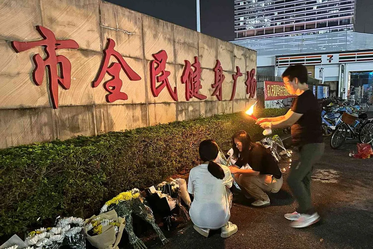 Man drives into crowd at Chinese sports center: dozens affected