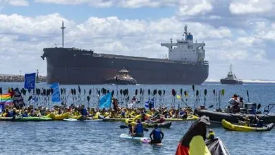 3 arrested as hundreds block Australia's biggest coal port in climate action