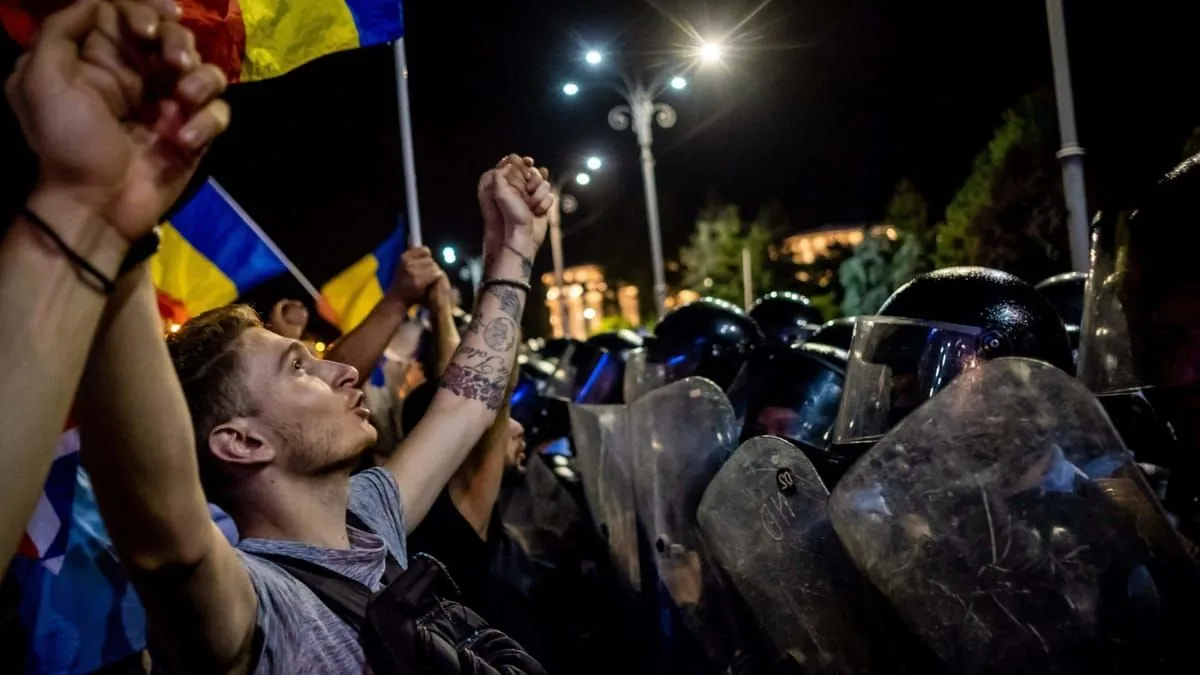 Romanian streets fill with protesters as unexpected presidential vote shocks nation