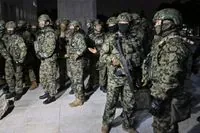 South Korean troops take over parliament after surprise martial law announcement